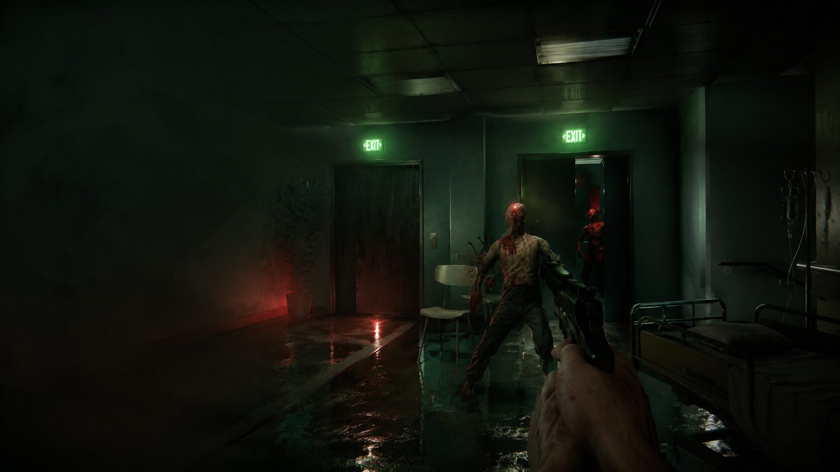 A quiet, green-lit hospital corridor