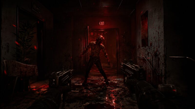 An infected closing in inside a blood-lit hospital corridor as the player levels a weapon